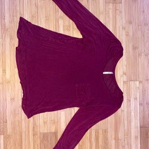 Burgundy long sleeved t-shirt with pocket.